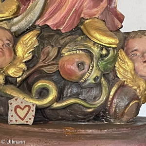 Teufelsschlange verschluckt sich am Apfel